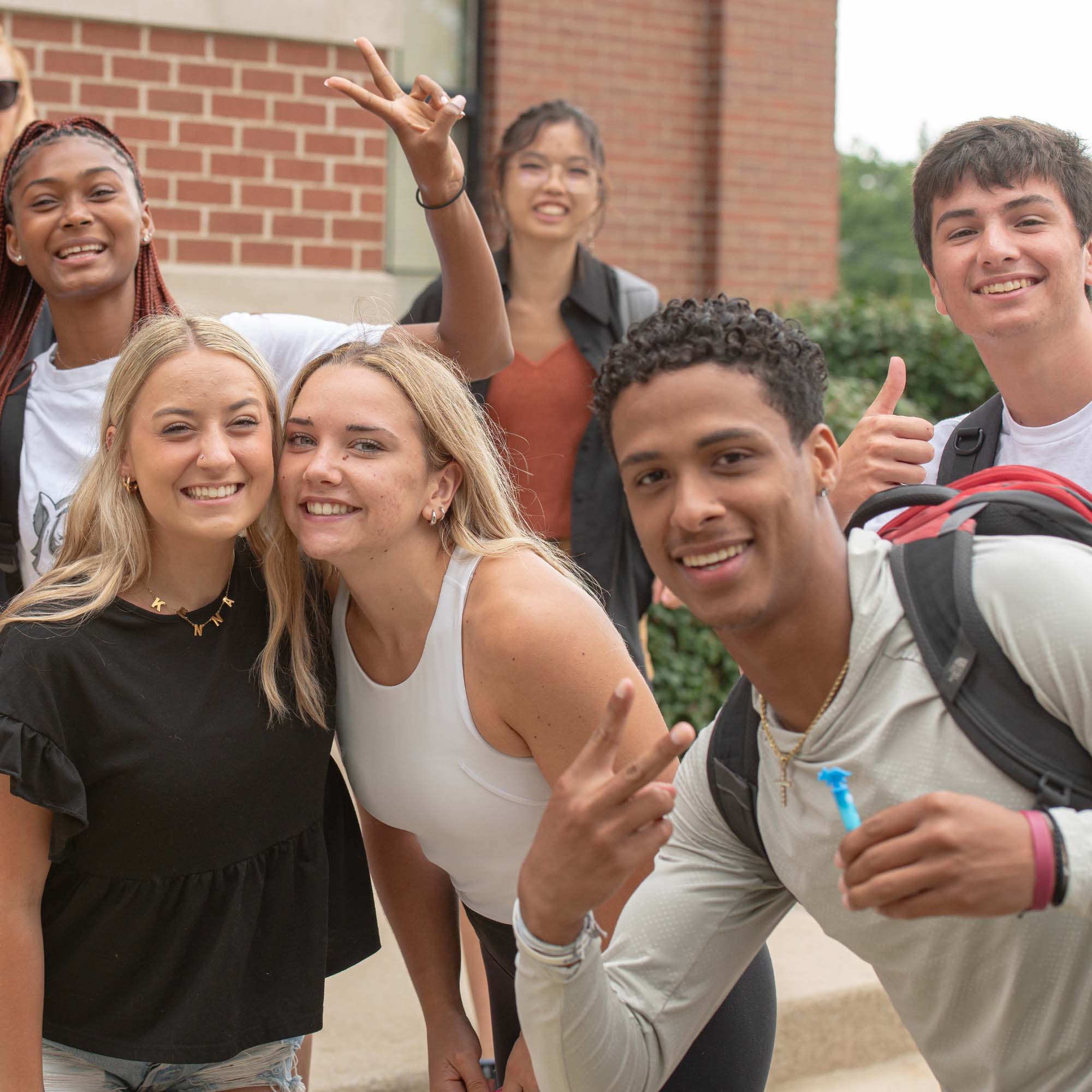 Students with thumbs up