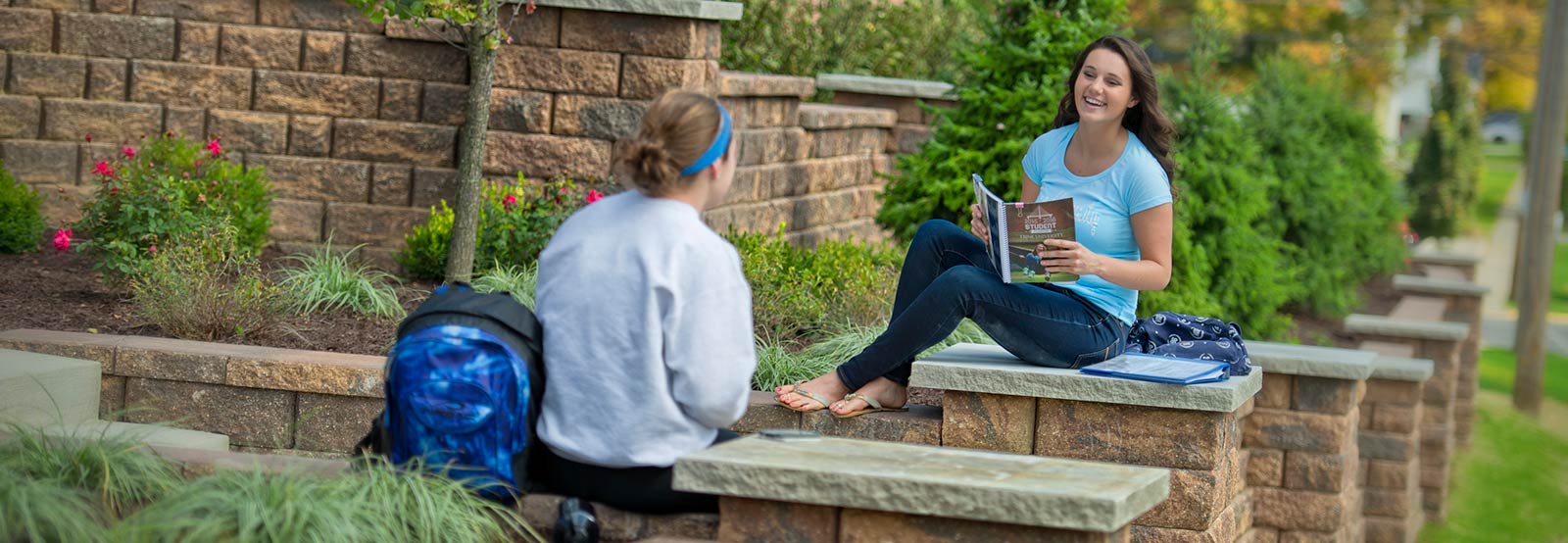 Friends sitting on the Garden Wall