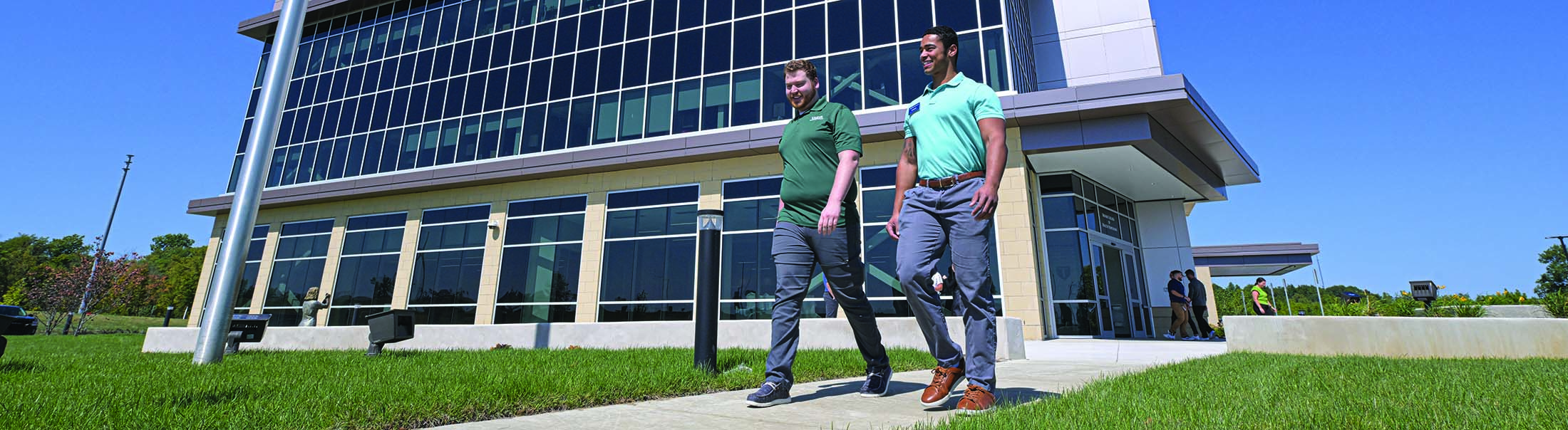 Students walking in front of Brooks College of Health Professions