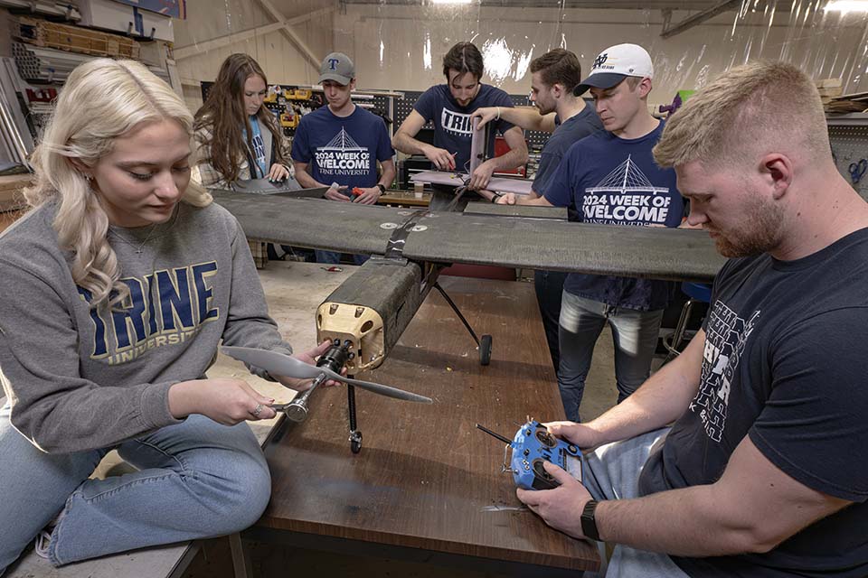 AIAA student team working on aircraft