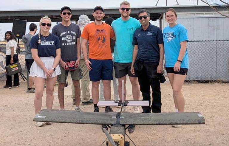 Student AIAA team with aircraft