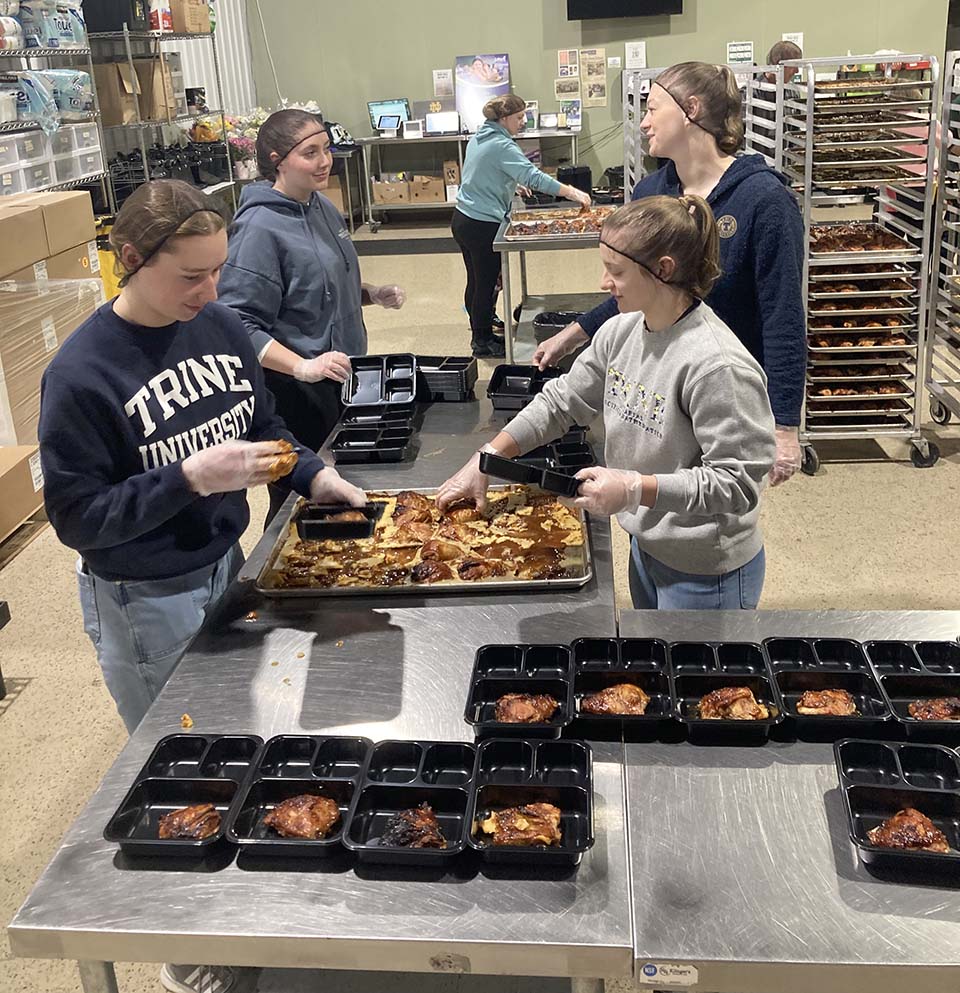 Students packing meals