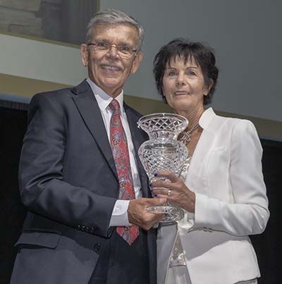 Dr. Brooks and Kathy Eikenberry with the Woman of Distinction Award
