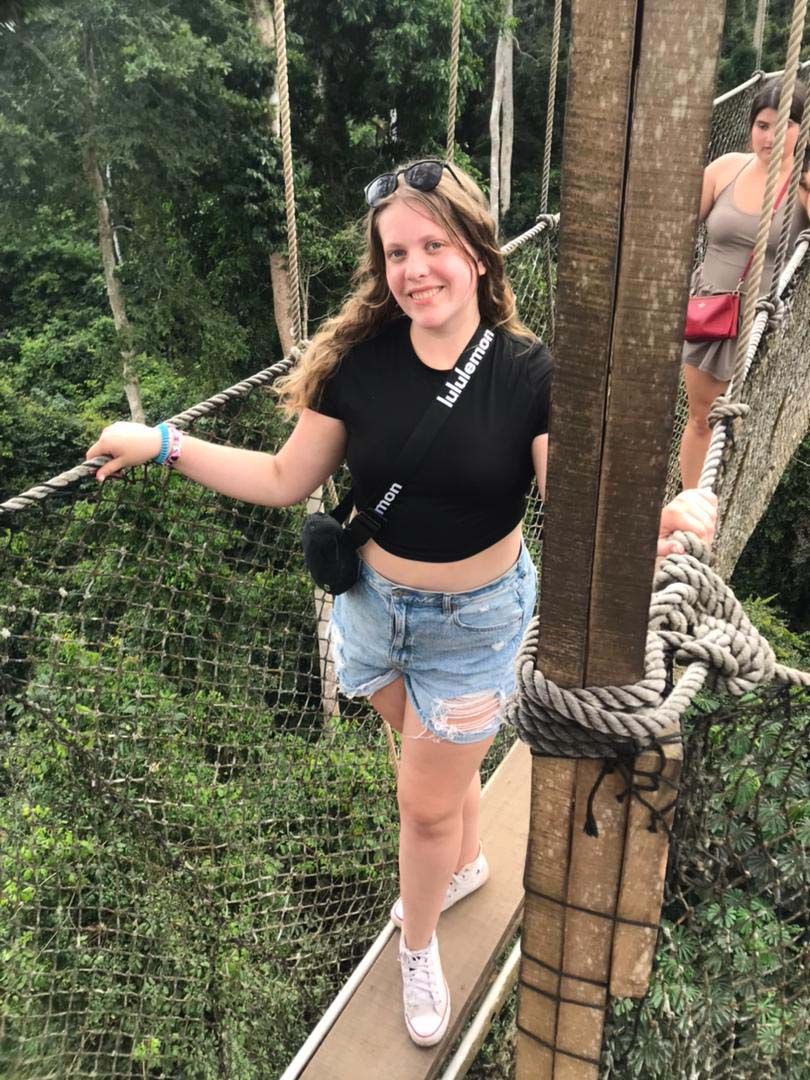 Mackenzie Rosenau on the Kakum Canopy walk in Ghana