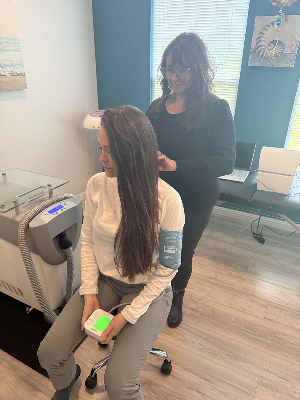 Angela Kesler Santoro preparing for cryotherapy.