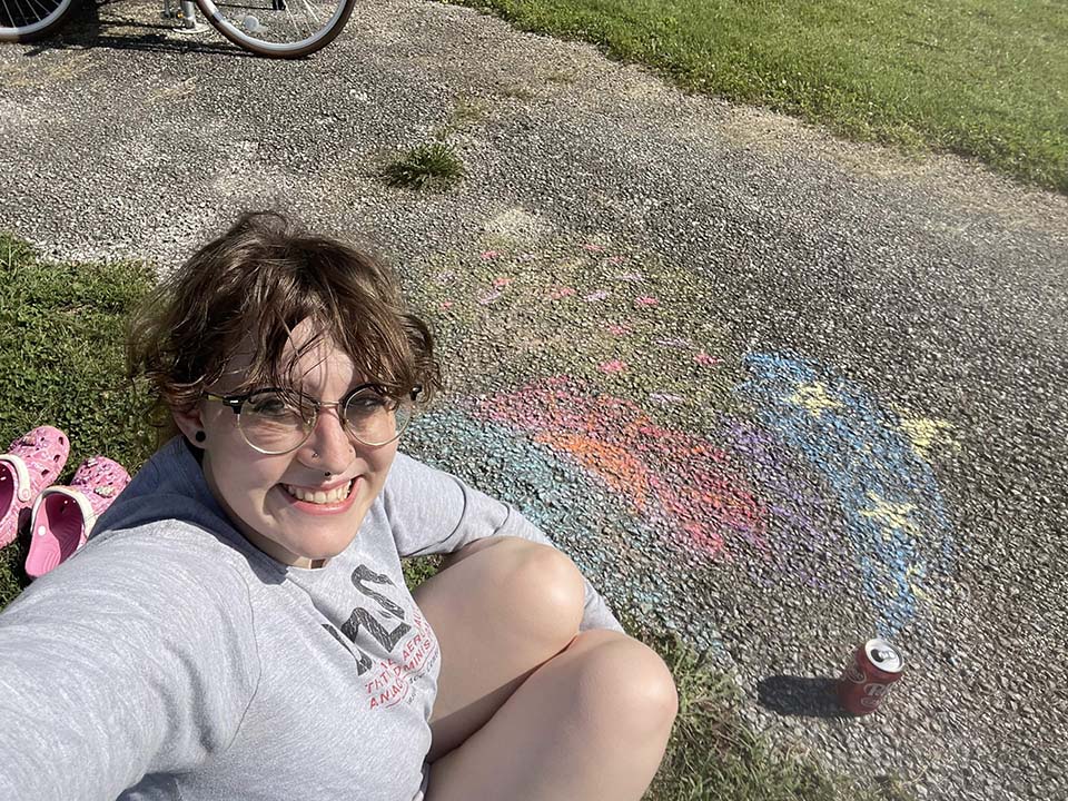 Aylee Rupert with chalk drawing