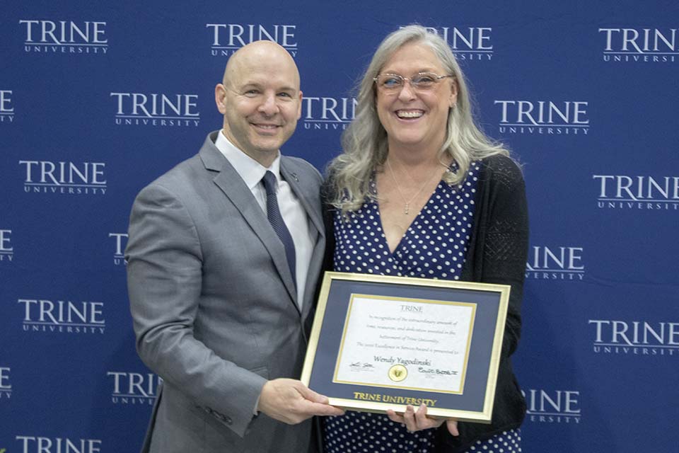 Dr. Kline presents award to Wendy Yagodinski