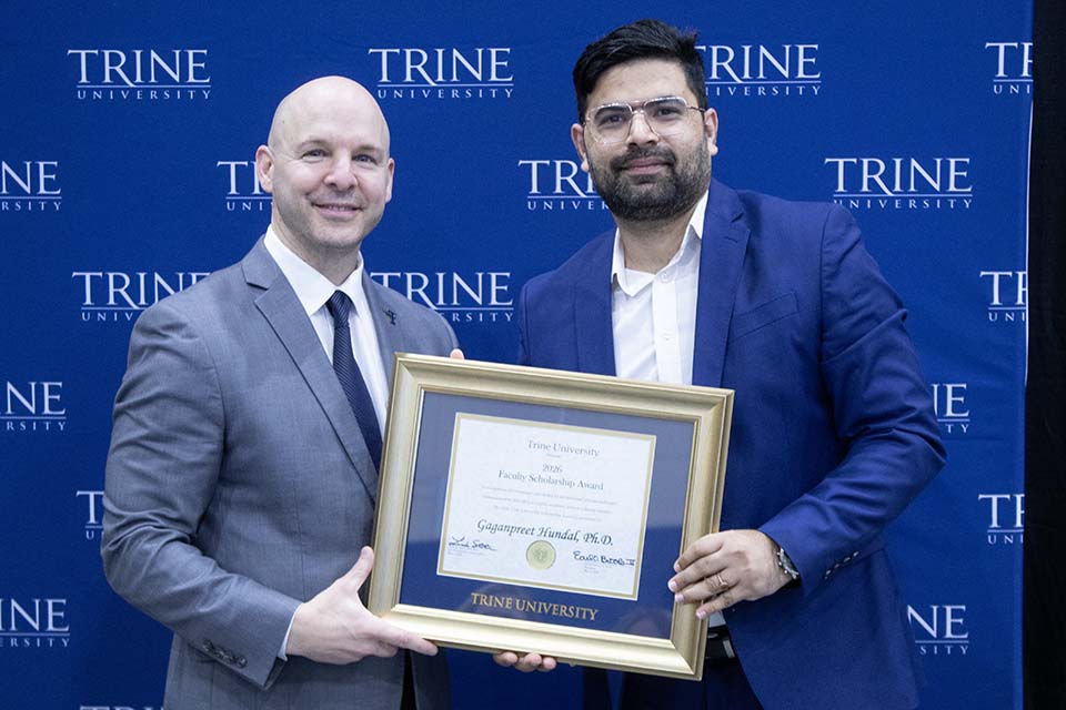 Dr. Kline presents award to Dr. Hundal