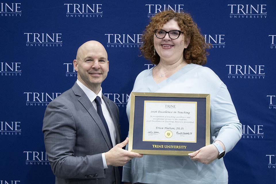 Dr. Kline presents award to Dr. Hutton