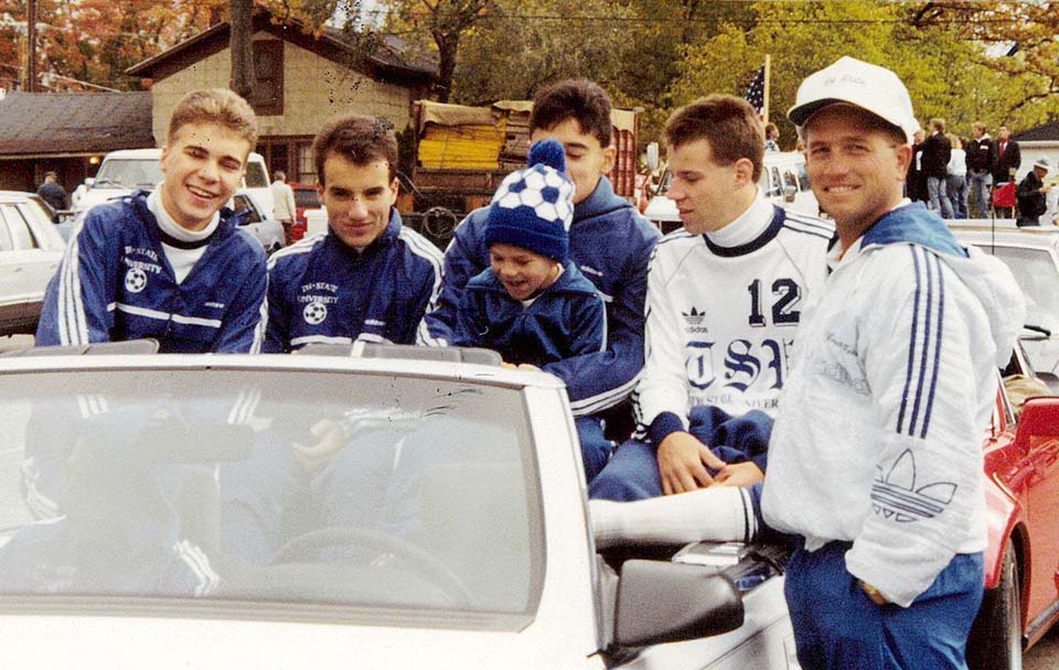 Soccer players with Coach Mike Ferrell in 1991