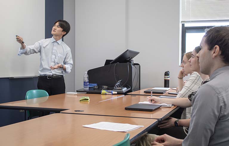 Dr. Arahari speaking to faculty and students